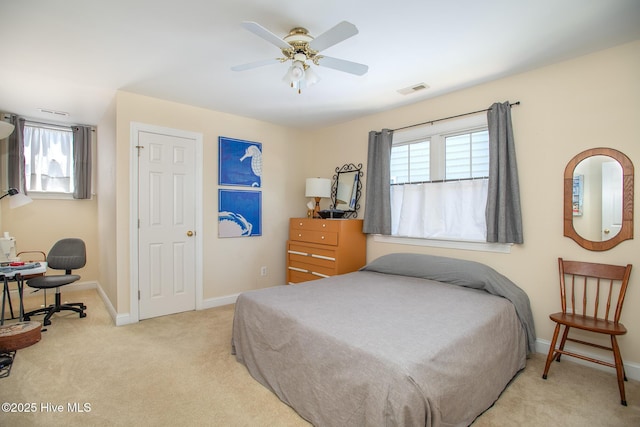 102 Macgregor Dr, Beaufort, NC 28516 - bedroom featuring light colored carpet, baseboards, and a ceiling fan