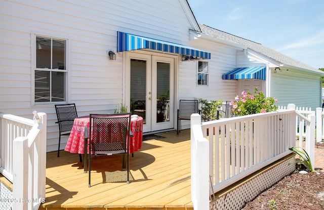 102 Macgregor Dr, Beaufort, NC 28516 - wooden terrace with french doors and outdoor dining area