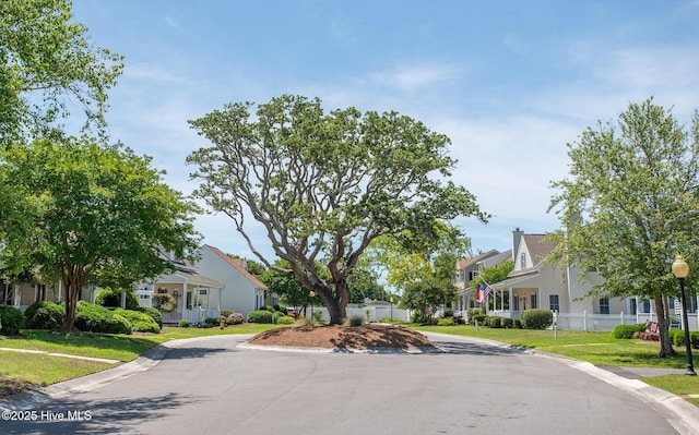 102 Macgregor Dr, Beaufort, NC 28516 - view of asphalt street featuring street lights, a residential view, and curbs