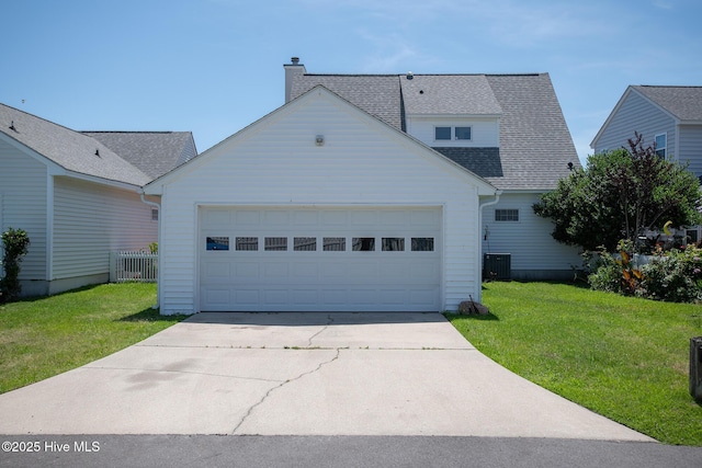 102 Macgregor Dr, Beaufort, NC 28516 - traditional-style home with driveway, a front lawn, a shingled roof, an attached garage, and a chimney