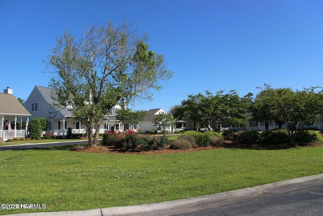 102 Macgregor Dr, Beaufort, NC 28516 - view of front facade with a front lawn and a residential view