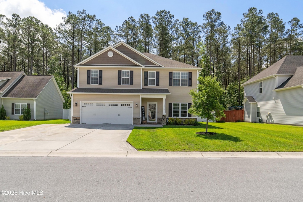 224 Wood House Dr, Jacksonville, NC 28546 - craftsman-style home with an attached garage, concrete driveway, and stone siding