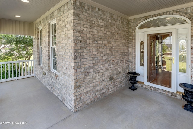 1109 Rollingwood Ct, Leland, NC 28451 - entrance to property featuring a porch and brick siding