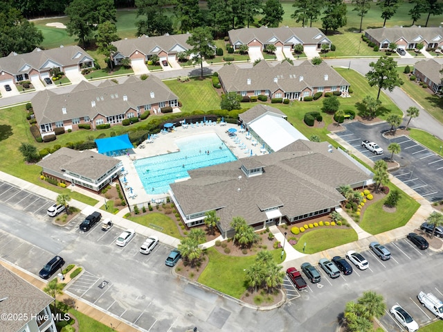 1109 Rollingwood Ct, Leland, NC 28451 - aerial perspective of suburban area with a pool area
