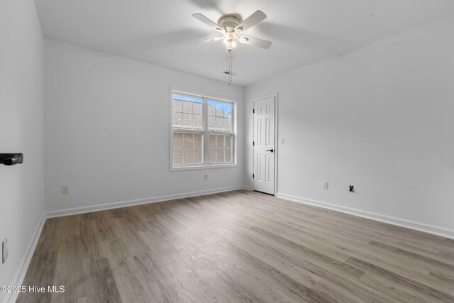 417 Settlers Ln, Kure Beach, NC 28449 - unfurnished room with ceiling fan, wood finished floors, and baseboards