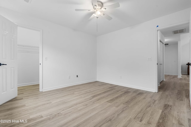 417 Settlers Ln, Kure Beach, NC 28449 - spare room featuring a ceiling fan, light wood-style flooring, and baseboards