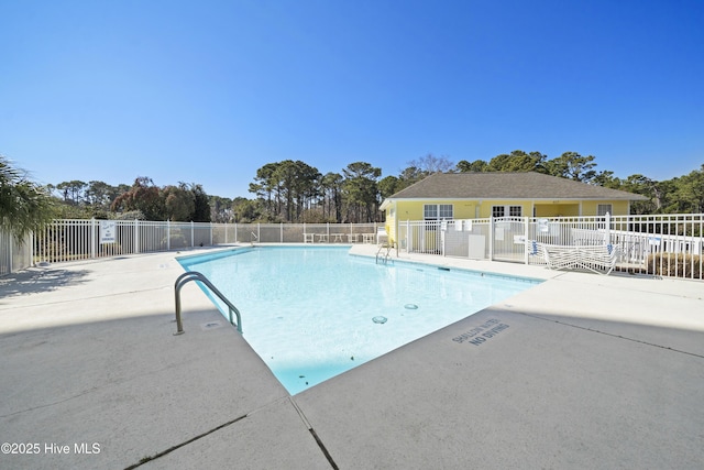 417 Settlers Ln, Kure Beach, NC 28449 - community pool with fence and a patio area
