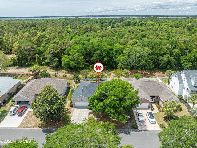 417 Settlers Ln, Kure Beach, NC 28449 - aerial perspective of suburban area with a forest