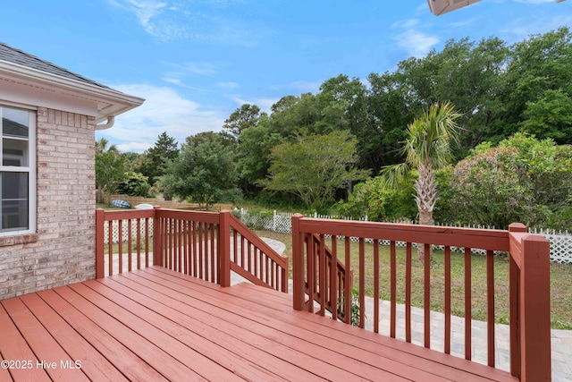 417 Settlers Ln, Kure Beach, NC 28449 - deck with a fenced backyard and view of scattered trees