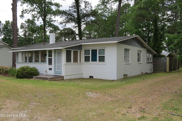 view of front of property with roof with shingles