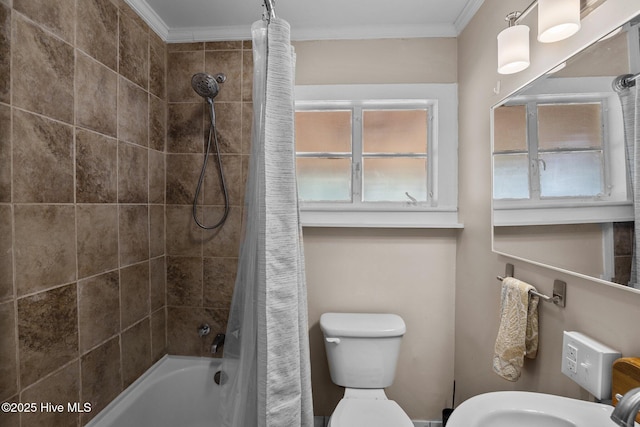full bathroom featuring crown molding, shower / bath combo with shower curtain, and toilet