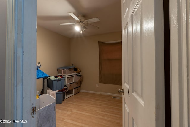 705 Dennis Rd, Jacksonville, NC 28546 - miscellaneous room with ceiling fan, light wood-type flooring, and baseboards
