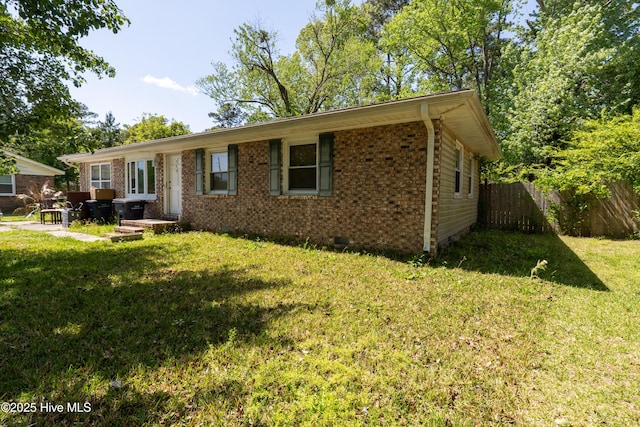 705 Dennis Rd, Jacksonville, NC 28546 - view of front facade featuring brick siding and crawl space