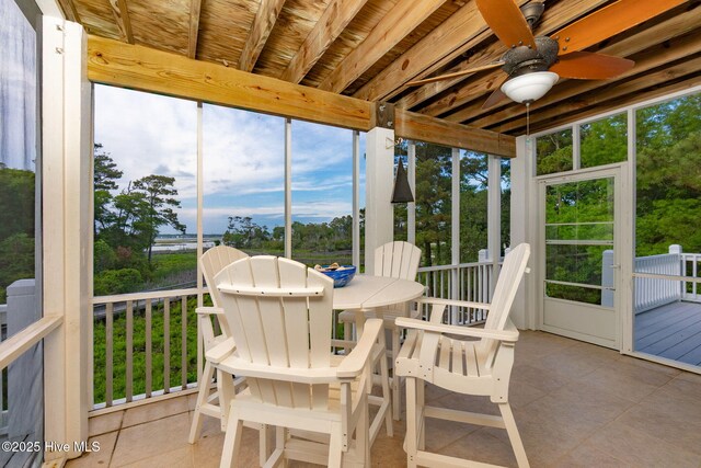 9808 Clarendon Dr, Emerald Isle, NC 28594 - sunroom with ceiling fan, outdoor dining area, and plenty of natural light