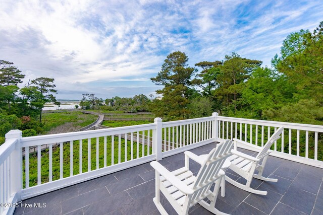 9808 Clarendon Dr, Emerald Isle, NC 28594 - view of patio / terrace with a water view