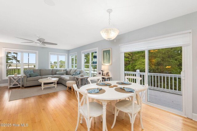 9808 Clarendon Dr, Emerald Isle, NC 28594 - dining room featuring light wood-style floors and a ceiling fan