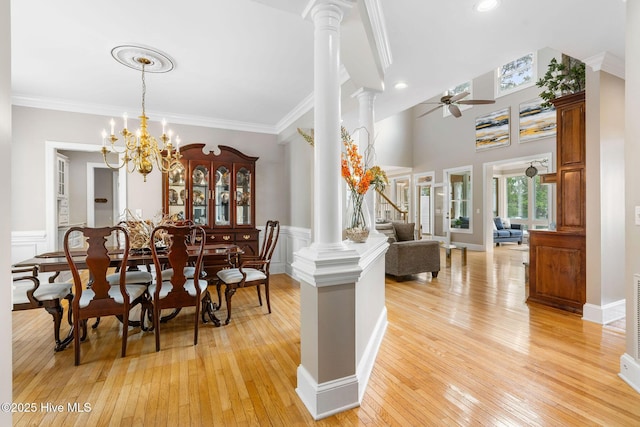 dining room with light wood-style floors, ornamental molding, ceiling fan, ornate columns, and recessed lighting