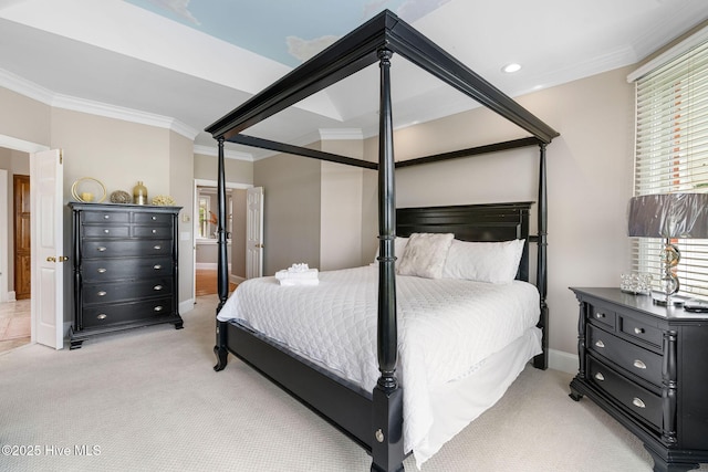 bedroom featuring crown molding, light carpet, and baseboards