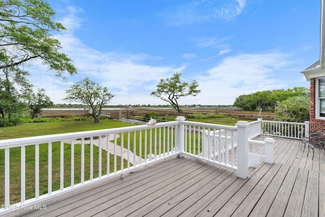 wooden terrace with a rural view