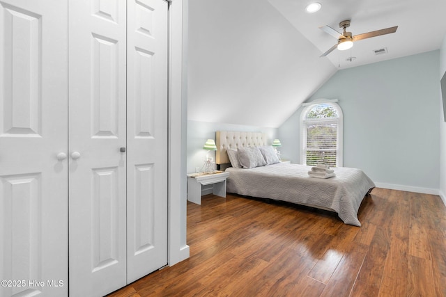 bedroom with lofted ceiling, wood finished floors, baseboards, recessed lighting, and ceiling fan