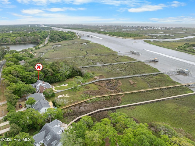 aerial overview of property's location with a nearby body of water