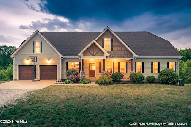 8295 Antioch Church Rd, Middlesex, NC 27557 - view of front of property featuring driveway, a garage, a front yard, a porch, and cooling unit