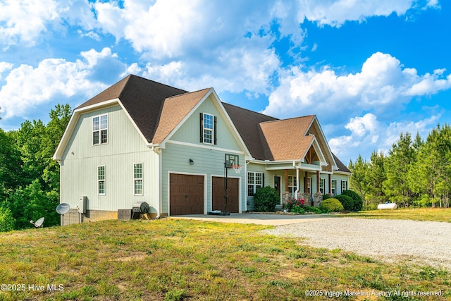 8295 Antioch Church Rd, Middlesex, NC 27557 - view of front of home featuring concrete driveway, a garage, and a front lawn