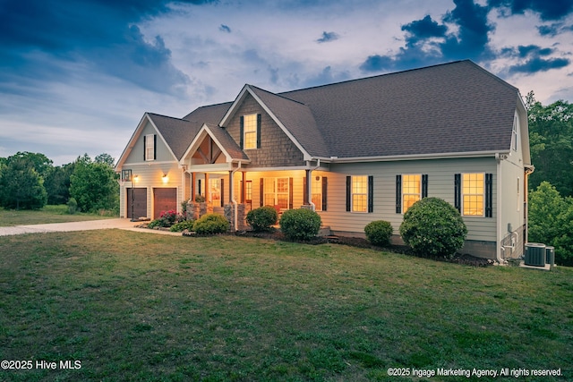 8295 Antioch Church Rd, Middlesex, NC 27557 - craftsman-style house with covered porch, an attached garage, a front yard, concrete driveway, and central AC