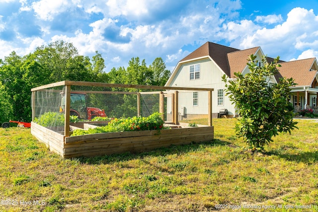 8295 Antioch Church Rd, Middlesex, NC 27557 - rear view of house featuring a garden and a lawn