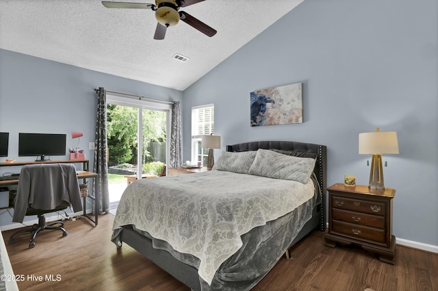 bedroom with a desk, access to exterior, a textured ceiling, wood finished floors, and ceiling fan