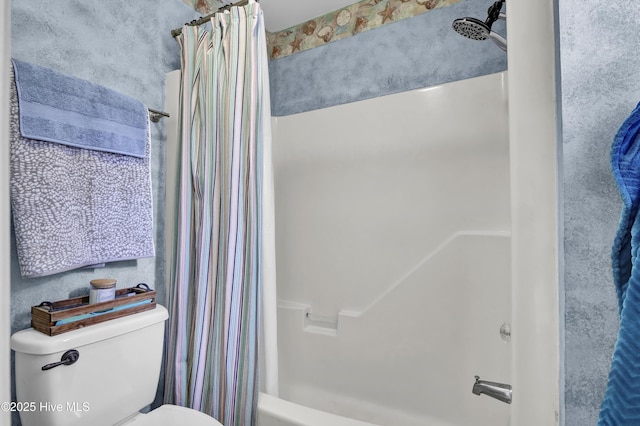 full bath featuring toilet and shower / bath combo