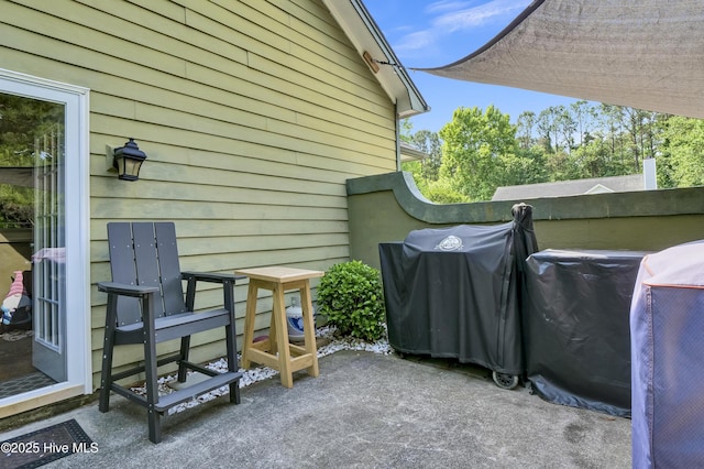 view of home's exterior with a patio area