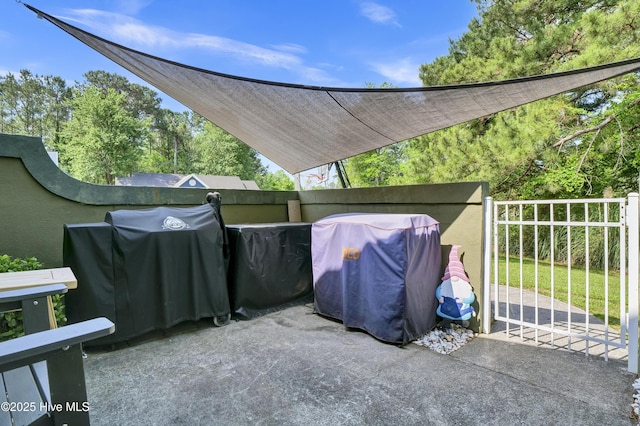 view of patio / terrace with fence