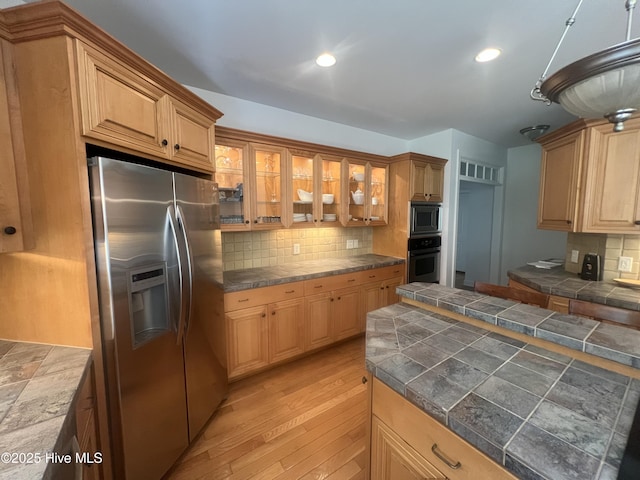 50 Short Rd, Pinehurst, NC 28374 - kitchen featuring stainless steel appliances, backsplash, light wood finished floors, glass insert cabinets, and recessed lighting