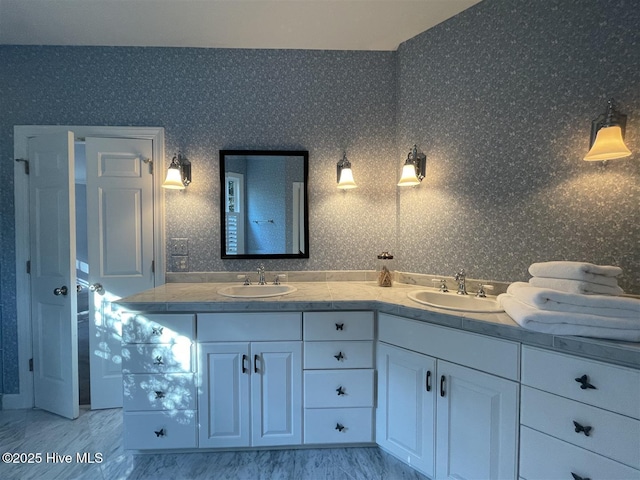 50 Short Rd, Pinehurst, NC 28374 - bathroom featuring double vanity and marble look tile flooring