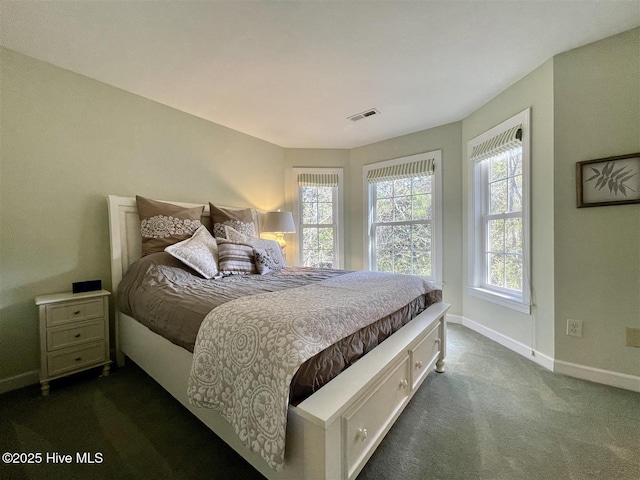 50 Short Rd, Pinehurst, NC 28374 - bedroom featuring dark carpet and baseboards