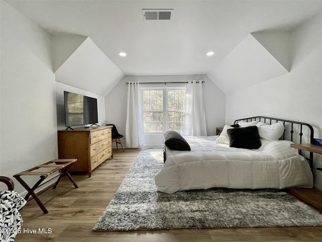 50 Short Rd, Pinehurst, NC 28374 - bedroom featuring vaulted ceiling, wood finished floors, and recessed lighting
