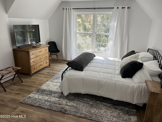50 Short Rd, Pinehurst, NC 28374 - bedroom featuring lofted ceiling and wood finished floors