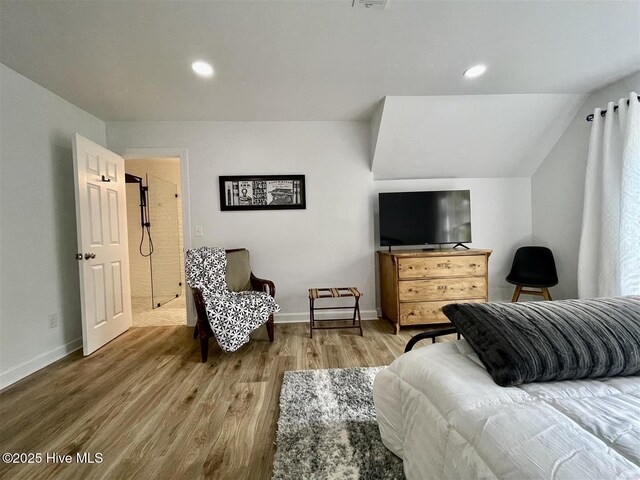 50 Short Rd, Pinehurst, NC 28374 - bedroom with wood finished floors, recessed lighting, and vaulted ceiling