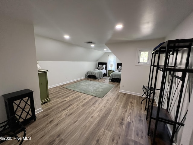 50 Short Rd, Pinehurst, NC 28374 - bedroom with wood finished floors, lofted ceiling, and recessed lighting