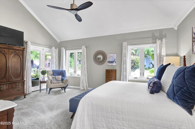 carpeted bedroom featuring vaulted ceiling, crown molding, ceiling fan, and baseboards