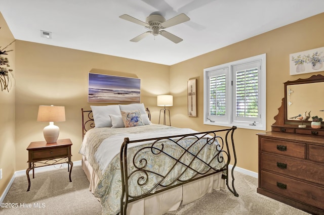 bedroom with carpet flooring, baseboards, and ceiling fan