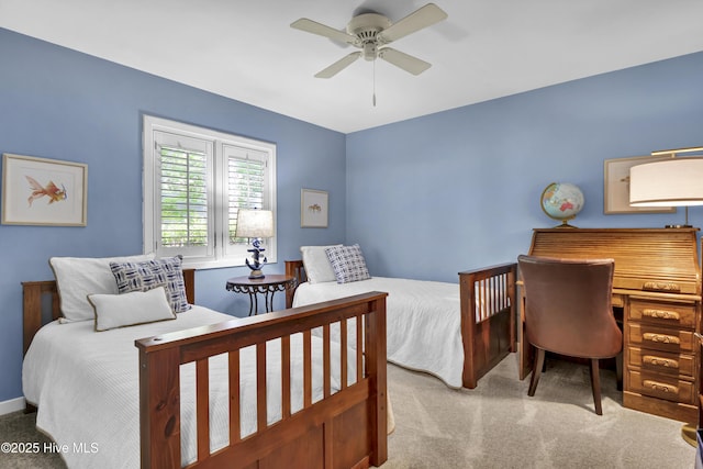 carpeted bedroom with a ceiling fan