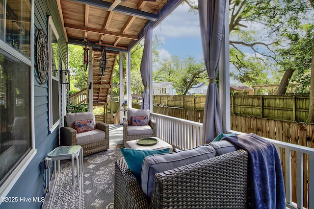 sunroom / solarium with outdoor lounge area