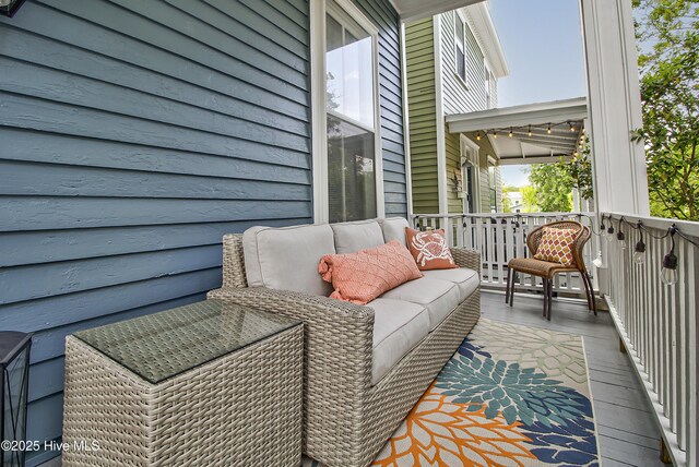 balcony with an outdoor hangout area