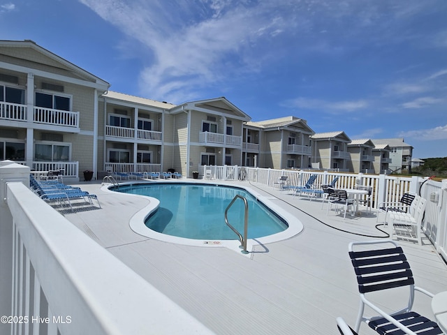 602 W Fort Macon Rd W Unit 138, Atlantic Beach, NC 28512 - community pool featuring a patio and a residential view