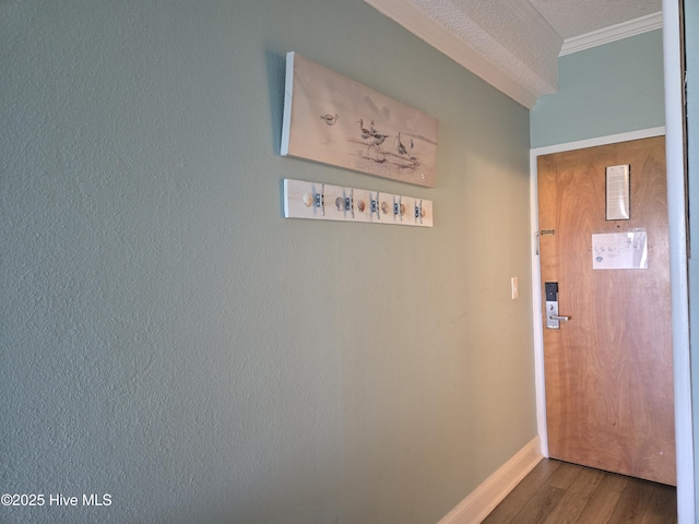 602 W Fort Macon Rd W Unit 138, Atlantic Beach, NC 28512 - entryway with wood finished floors, ornamental molding, and baseboards