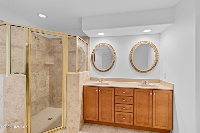 1103 Groppo Cv, Wilmington, NC 28412 - full bathroom with a shower stall, double vanity, and recessed lighting