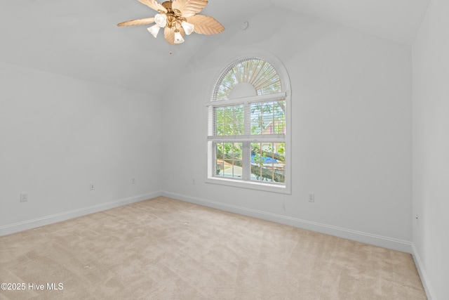 1103 Groppo Cv, Wilmington, NC 28412 - carpeted empty room featuring plenty of natural light, lofted ceiling, a ceiling fan, and baseboards