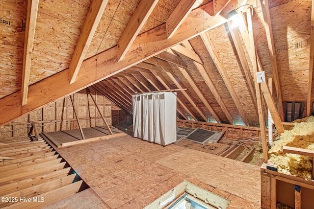 view of unfinished attic